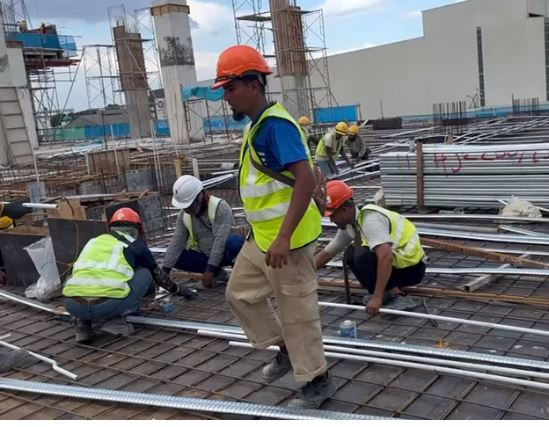Construction workers at a building site